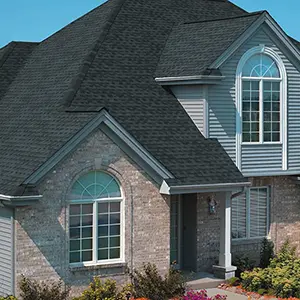 Home with black roof shingles